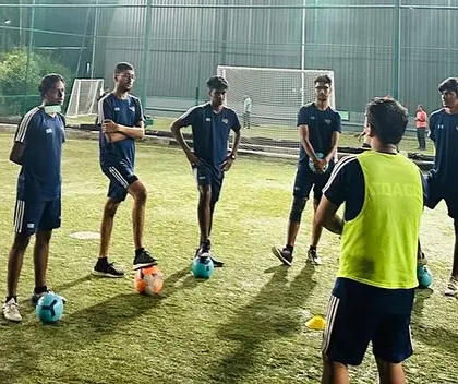 More images showcasing our dedicated coaching team during their own training sessions, meetings, and practice games.