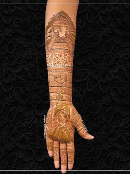 This full-arm bridal design features a beautiful bride figure on the palm and two peacocks on the arm. The combination of figures and traditional motifs creates a balanced and stunning look.