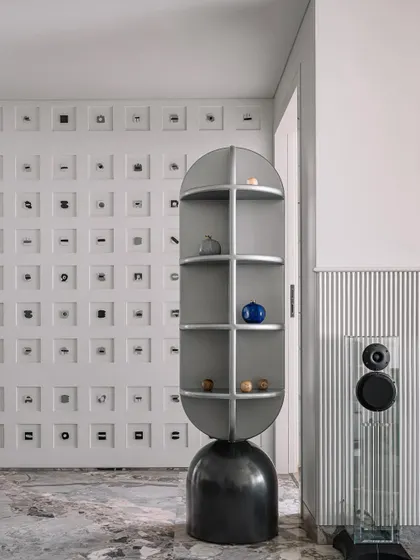 This sculptural totem at Frenchie Haus doubles as a display feature. It adds to the 'house of curiosity' theme and showcases our love for creating functional art.