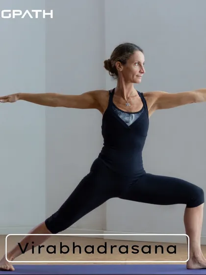 Building Power with Virabhadrasana (Warrior Pose): The Warrior series is fundamental for building strength and stamina in the legs and core. This powerful standing pose is a staple in our fitness-focused yoga sessions.