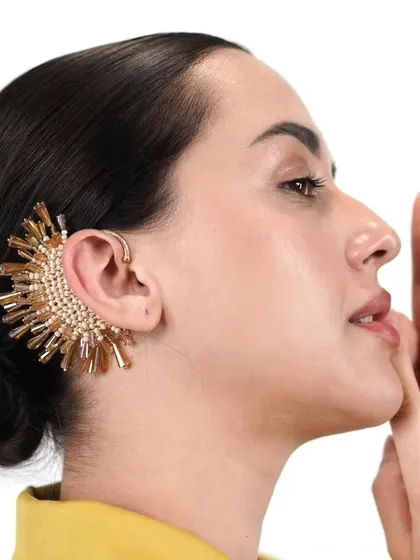 Our newly added golden sunburst earcuff is crafted by skilled artisans and makes a perfect statement.