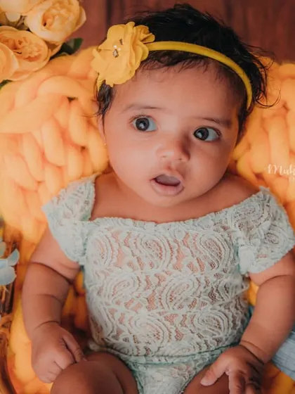 The look of surprise and curiosity on a baby's face is priceless. This is what milestone photography is all about.
