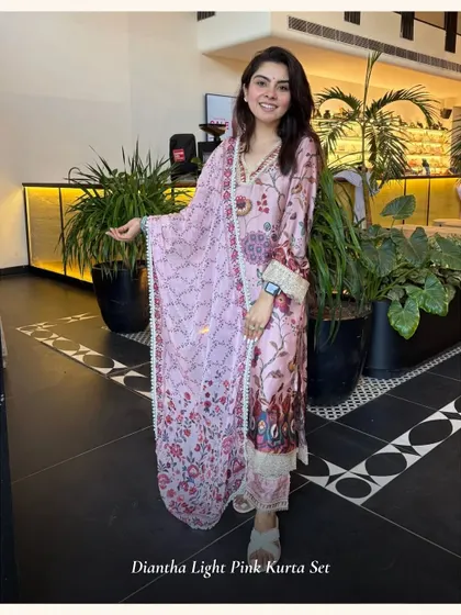 The Diantha Light Pink Kurta Set features a beautiful floral print and delicate embroidery. It's a feminine and elegant piece, now available as a deal of the day.