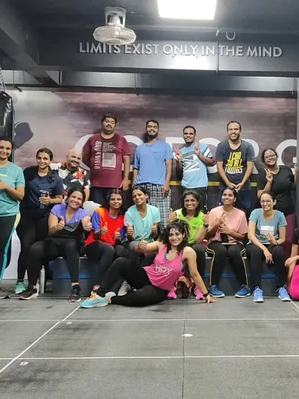 The heart and soul of my classes. Each photo captures a unique moment with my incredible community after a sweaty, joyful session. This is our shared victory lap.