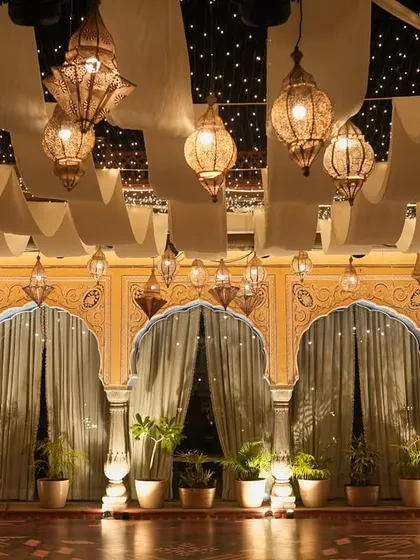 To highlight the venue's heritage architecture, we designed a dance floor with a ceiling of soft drapes, intricate laser-cut lamps, and a starry night effect.