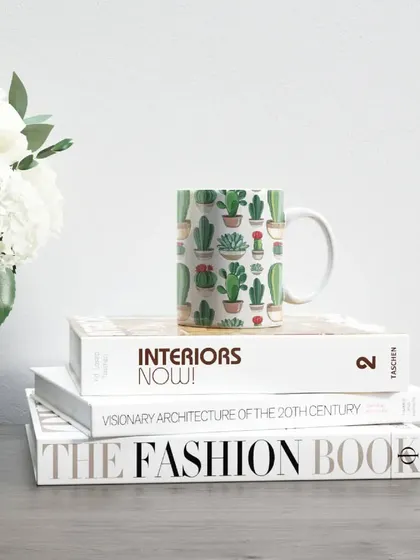 A cute and trendy cactus-themed mug, perfect for a plant lover. It adds a touch of quirky fun to a morning coffee routine.