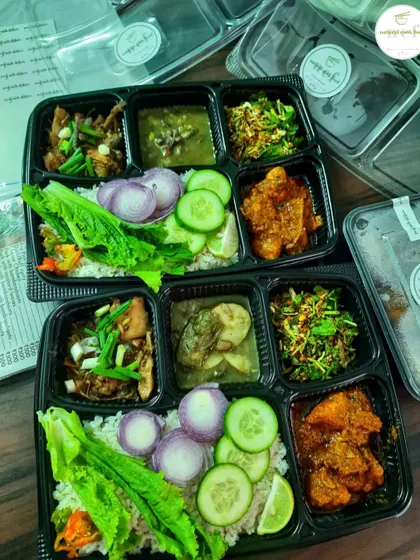 Presenting a variety of dishes in my takeaway thalis. Each compartment holds a different taste of Manipur, from curries to fresh sides.