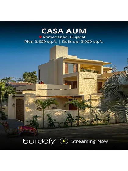 This exterior view of Casa AUM in Ahmedabad shows its 3,900 sq.ft. built-up area, demonstrating how we create a sense of spaciousness on a compact plot.