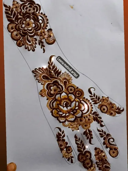 A beautiful floral design laid out on a practice hand sheet. This helps in visualizing how the design will look on a real hand.
