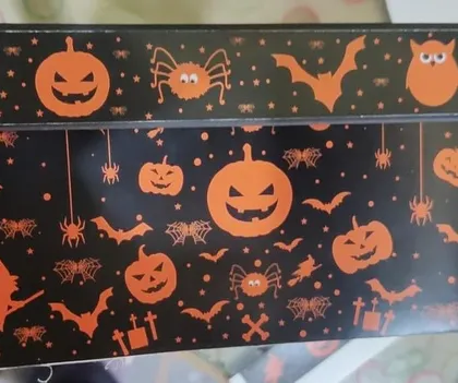 A close-up of the finished custom Halloween gift box. The spooky and fun design was a big hit for the event.
