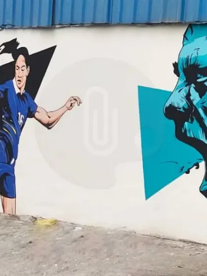A section of a long mural for a football ground in Gurgaon, featuring dynamic illustrations of players in action. The graphic style and geometric shapes add to the sense of movement.