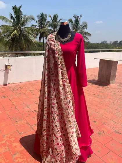 This pink Anarkali is a classic choice for any daytime function.