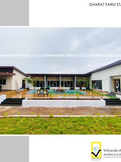 A view across the lawn towards the main building's long verandah. This open, connected space encourages guests to move freely and enjoy the fresh air and greenery.