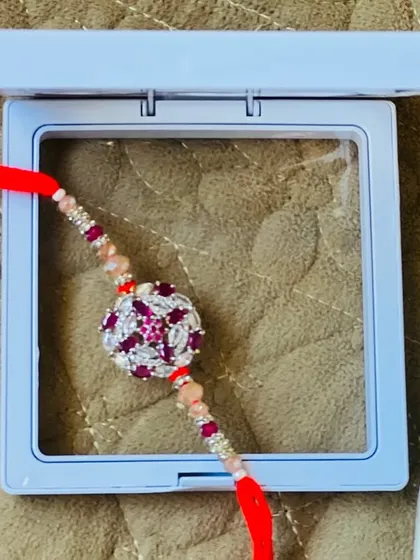 A detailed shot of the stunning, intricately designed rakhi included in one of my premium hampers.
