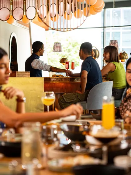 Whether you're at a table with friends or pulling up a seat at the bar, the atmosphere is always buzzing. It's a space designed for good food and even better company.