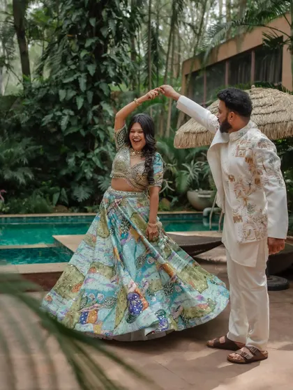 A fun, candid moment of the groom stealing a kiss. These spontaneous shots are often the most cherished, capturing the genuine joy and playfulness of the wedding day.