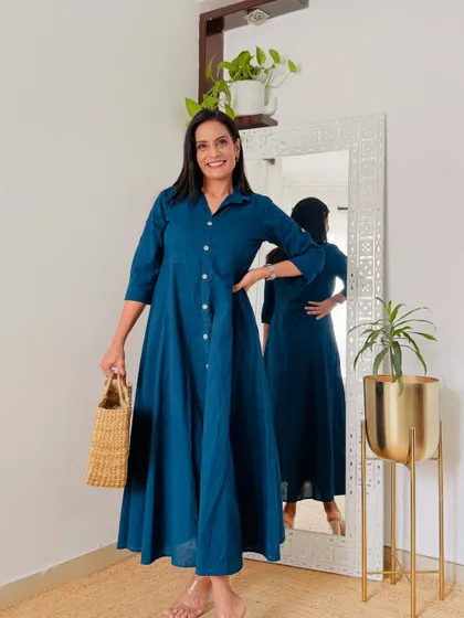 This blue shirt-style maxi dress is so comfortable and chic. It's a great one-and-done outfit for a relaxed day.