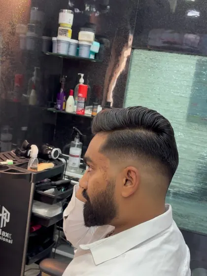 The back view of a pompadour with a fade.
