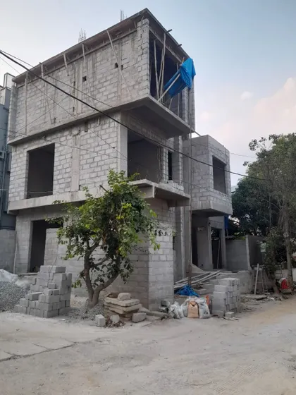 Another angle of the 'Nidhi Nilayam' construction site. Seeing the building's skeleton like this is a critical part of the architectural process, where we verify that the design vision is being executed correctly on the ground.