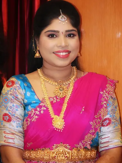A happy bride on her engagement day. The makeup is designed to last through all the festivities while keeping her looking fresh and beautiful.