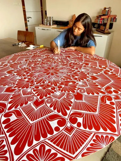 This bold red and white mandala made its way to its new home today. I love working with such strong and vibrant colors.