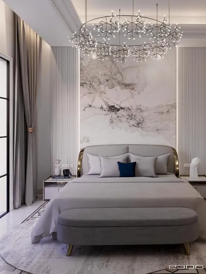 A serene and luxurious bedroom design, featuring a statement marble wall behind the bed. A contemporary "stardust" chandelier adds a touch of magic, while the neutral color palette creates a calming retreat.
