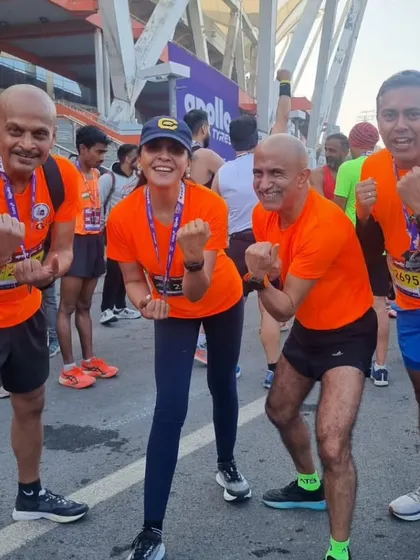 Four of our runners, beaming with pride after the New Delhi Marathon. The hard work paid off.