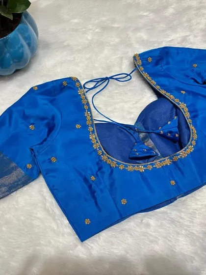 Blue that calms, handwork that charms. Sometimes, simplicity makes the loudest statement.