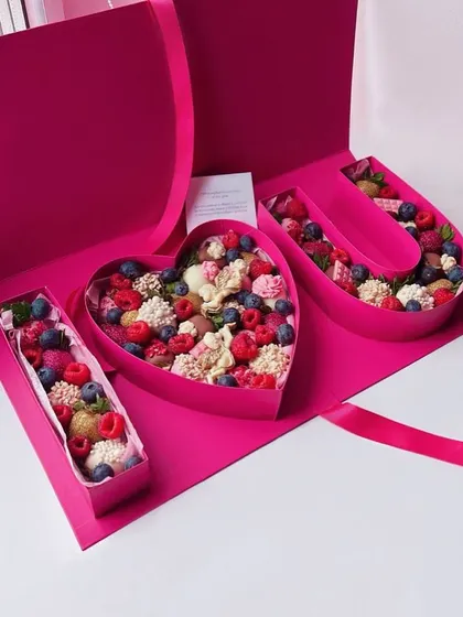 A unique way to say "I Love You". These letter and heart shaped boxes are filled with a delicious mix of chocolate covered strawberries, fresh berries, and other sweet treats.