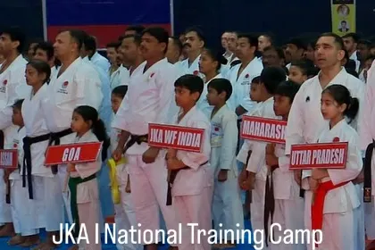 Students from different states, including Uttar Pradesh, Goa, and Maharashtra, line up at a JKA National Training Camp. This shows the unity and national scope of our organization.