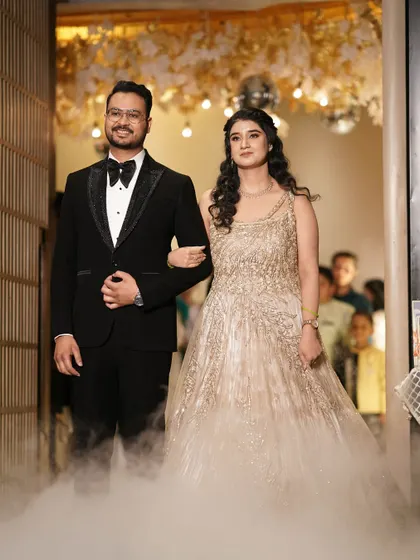 The grand entrance. Her makeup looks stunning even from a distance, with a beautiful glow.