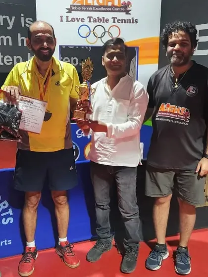 Presenting the award to a finalist. Along with trophies, we often provide goodies and prizes to make the win even sweeter.