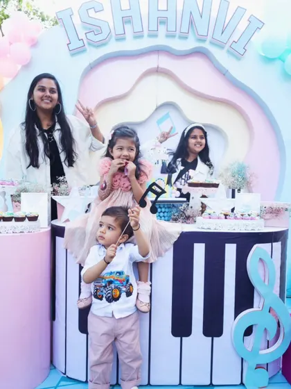 All the little guests gather around the piano-themed dessert bar, excited to celebrate with the birthday girl. These are the moments of friendship and fun that make a party special.