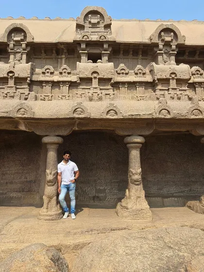 Inside one of the Mandapa cave temples, known for their intricately carved pillars and panels depicting mythological stories.