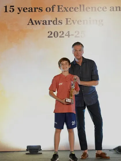 Tomas from our U13 team receiving his Best Player award. Being recognized by your teammates is one of the highest honors.