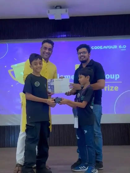 Team Aqua Buddy receiving their Appreciation Award at the Codeavour Nationals. Their innovative project stood out to the judges.