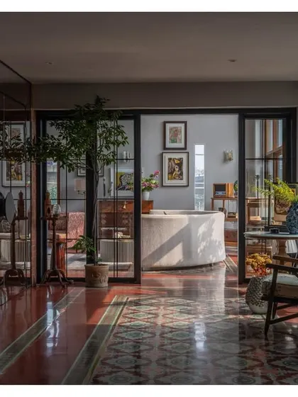 This is one of my favorite shots from the Dhaka project, capturing the soul of the space. The play of light and shadow across the patterned floors and through the glass partitions creates a feeling of depth and tranquility.