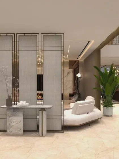 This shot highlights the elegant partition screen and console table that create a welcoming foyer area within the larger open-plan living space. It’s about creating defined zones that still feel connected to the whole.