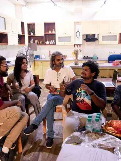 The team taking a break and sharing a laugh between takes. A positive and collaborative set environment is something I always strive for.