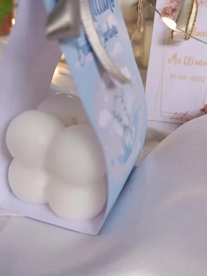 A close-up of the bubble candle in its custom packaging. This is a very popular and budget-friendly option for all kinds of events.