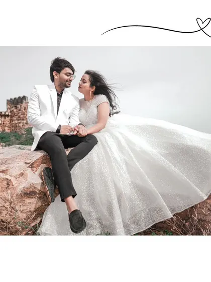 An intimate moment between the couple during their pre-wedding shoot at the majestic Gandikota canyon, showcasing their connection amidst a breathtaking landscape.