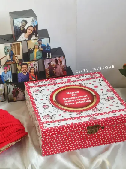 The complete set: a personalized keepsake box with the pop-up cubes and pyramid album. This one was for a first engagement anniversary.