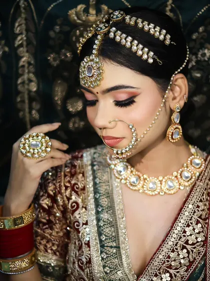 A luxurious velvet lehenga paired with soft, shimmering eye makeup. Our students learn to work with different fabrics and textures.