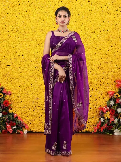 Another full view of the embroidered purple organza saree, a masterpiece of craftsmanship.