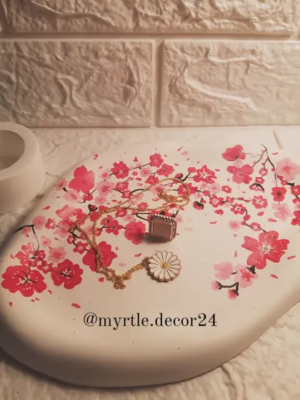 The 'after' shot. We hand-painted a beautiful cherry blossom design onto our cloud tray, turning it into a unique piece of art.