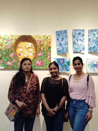 With visitors in front of my 'Lotus Buddha' and abstract paintings.