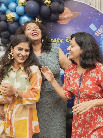 The joy of your friends and family is a huge part of the celebration. Capturing genuine laughter like this helps you remember how much fun everyone had.