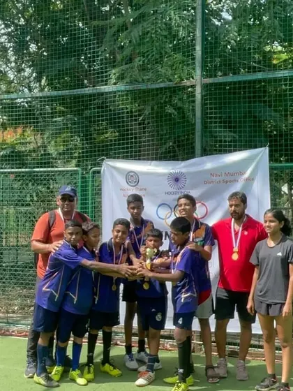 A group of our youngest champions with their coaches and medals. Events like these are a great way to introduce kids to competitive hockey in a fun environment.