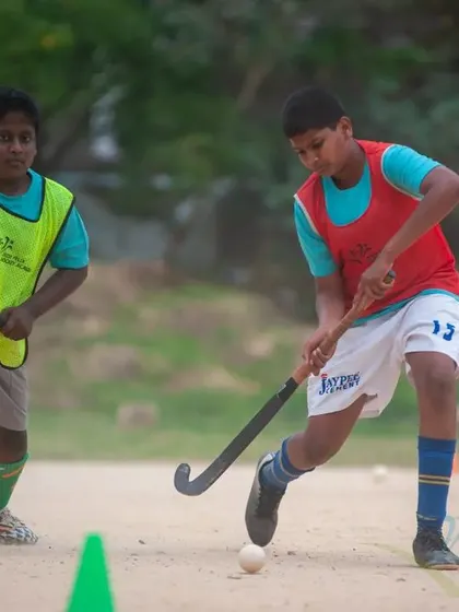 A player focuses on his technique during a drill at the 2022 summer camp. Practice and repetition are key to improvement.