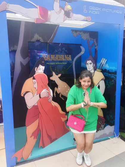 Engaging with a Ramayana anime exhibit at the festival. This image is special as it shows the intersection of Indian and Japanese art styles, reflecting my own identity as an Indian fan of Asian culture.